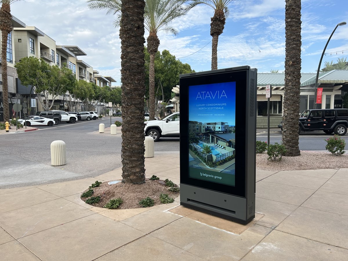 ATAVIA outdoor LCD totem display on a street corner